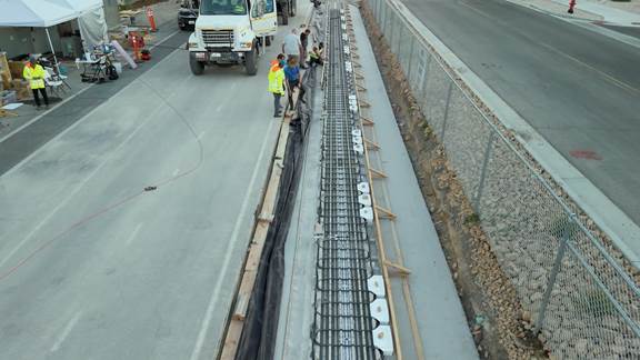 Top view of ENRX electric road track installation at ASPIRE EVR center without concrete.