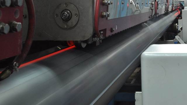 ENRX induction system performing seam normalising on a moving steel tube