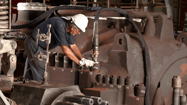 Induction heating used for expanding large industrial bolts during assembly and maintenance