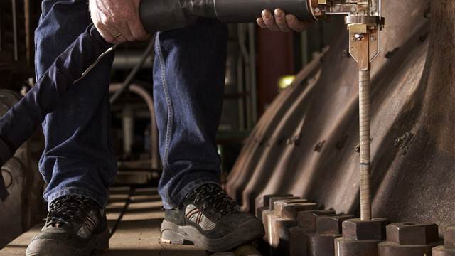  Induction heating coil applied to bolts during turbine maintenance
