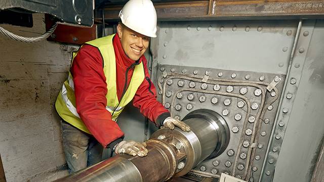 Induction heating used for shrink‑fitting and replacing shafts on an old bridge structure