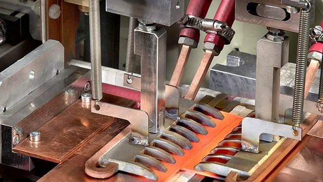 Induction heating applied to precision induction brazing of electric motor pole windings in an industrial production line