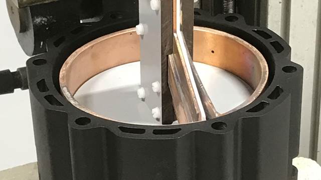 ENRX induction heating system used for shrink-fitting a stator housing with precise controlled heating