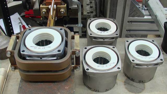 ENRX induction heating setup preparing motor housing components for shrink‑fitting