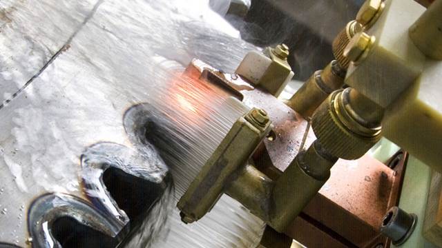 Induction hardening of gears