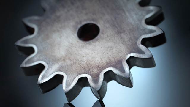 Close‑up of induction‑hardened gear wheel showing precise heat treatment for enhanced wear resistance and strength