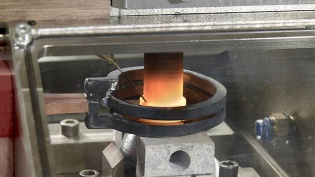 Banjo nipple heated inside ENRX induction coil for precision brazing