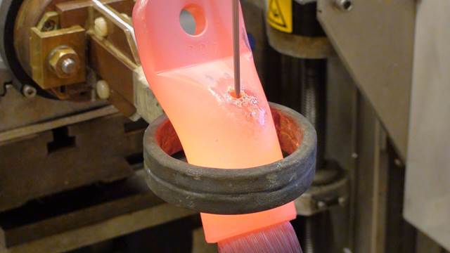 Cable shoe connector heated inside ENRX induction coil for precision brazing