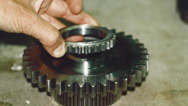 ENRX induction shrink‑fitted gear ring being positioned onto a larger gear component
