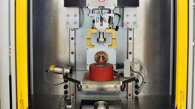 ENRX induction system shrink‑fitting a stator house in a controlled automated setup