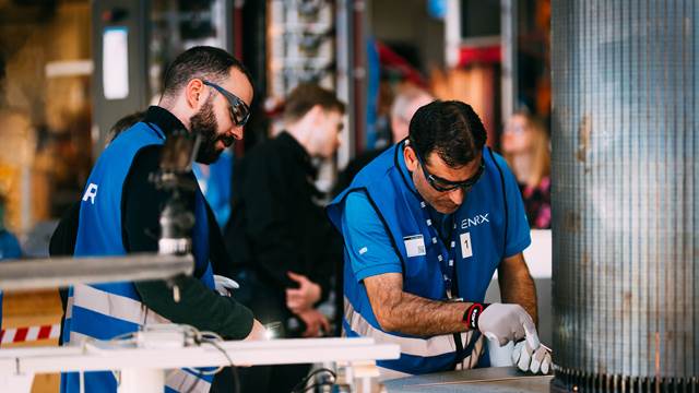 WEG engineers performing induction brazing tests using ENRX induction heating technology