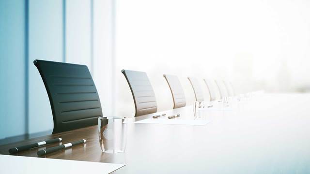 Illustrative image of a modern boardroom symbolizing ENRX corporate governance and leadership meetings