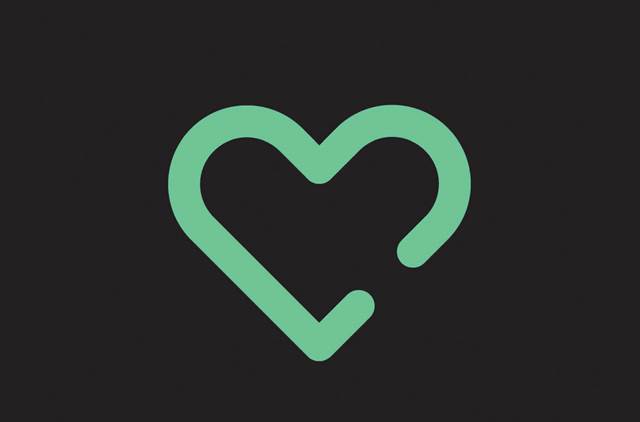 Icon representing the ENRX core value Passionate, depicted as a green heart symbol on a dark background