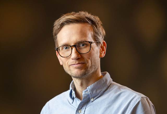 Portrait of Even Borhaug, CTO and Managing Director of ENRX Norway, wearing glasses and a light blue shirt.