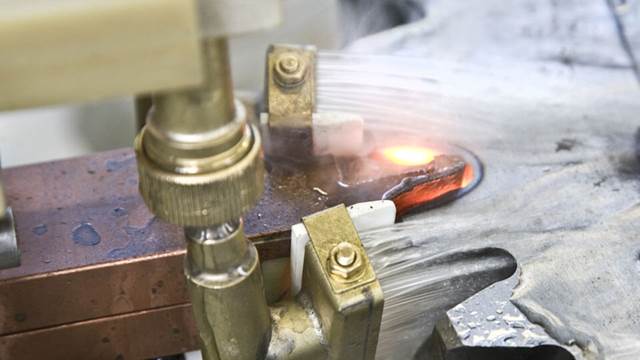 Induction hardening of a gear tooth using precision-controlled ENRX induction heating