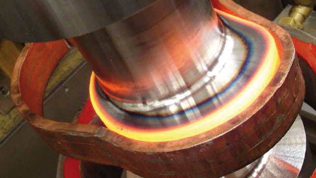 Customised coil for induction hardening of camshaft