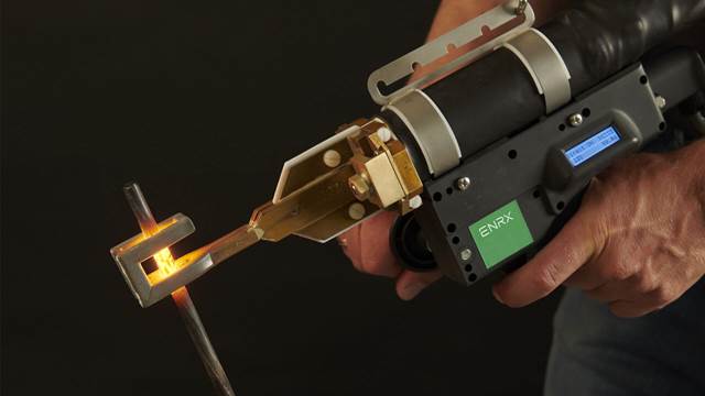 ENRX Minac handheld transformer induction brazing tool in use