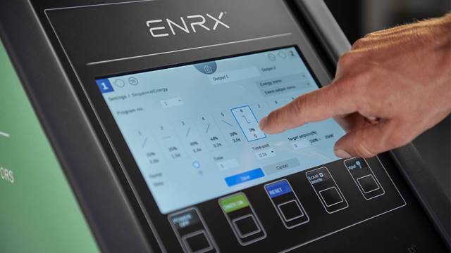 Close-up of ENRX Minac touch screen control panel for induction heating settings