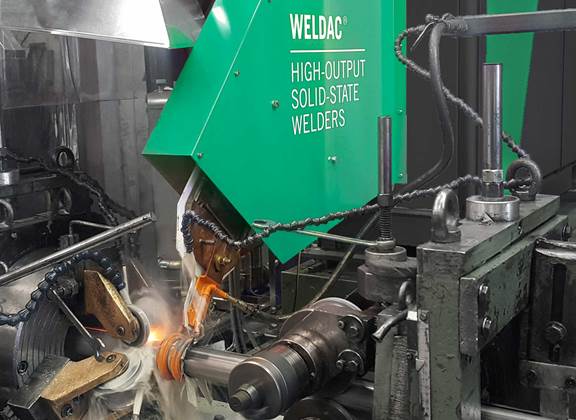 ENRX Weldac high-output induction tube welder in operation on a production line