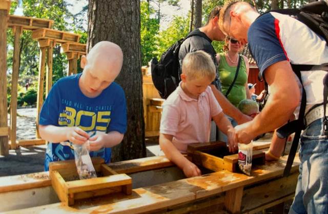 Children and adults taking part in a Telethon charity activity supported by ENRX