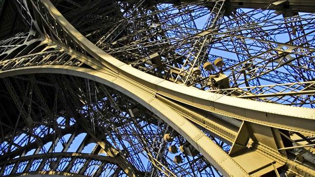Close-up view of Eiffel Tower steel framework highlighting precise metal joints