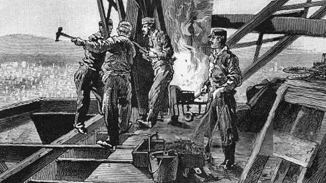Historical illustration of workers riveting steel beams before the advent of induction heating