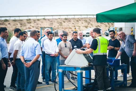 ENRX and Glensol team during a live induction heating demonstration showcasing advanced energy transfer technology.