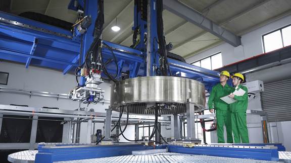 ENRX engineers supervising commissioning and start-up of a large induction heating system