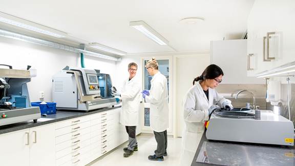 ENRX engineers performing laboratory trials and material analysis to support induction heating consultation services.