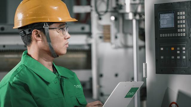 ENRX technician monitoring induction equipment performance as part of a Service Level Agreement to ensure reliability and uptime.