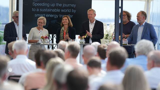 The rooftop terrace at AFK was packed with people during the ENRX debate on energy efficiency.